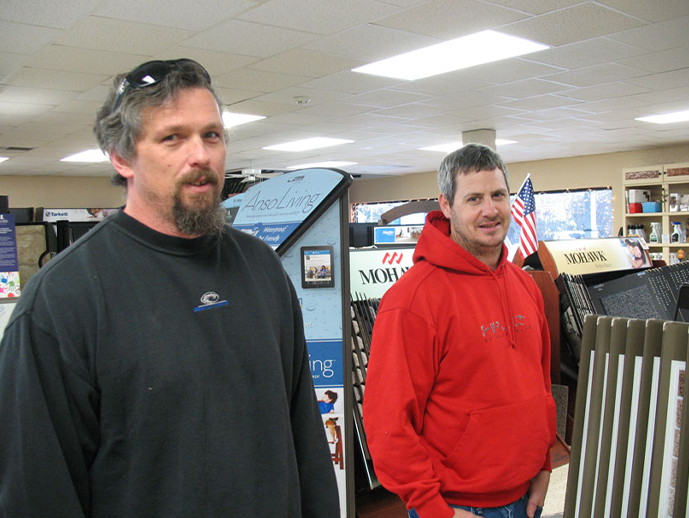 staff members at work - Kitty Hawk Carpets & Furniture in NC