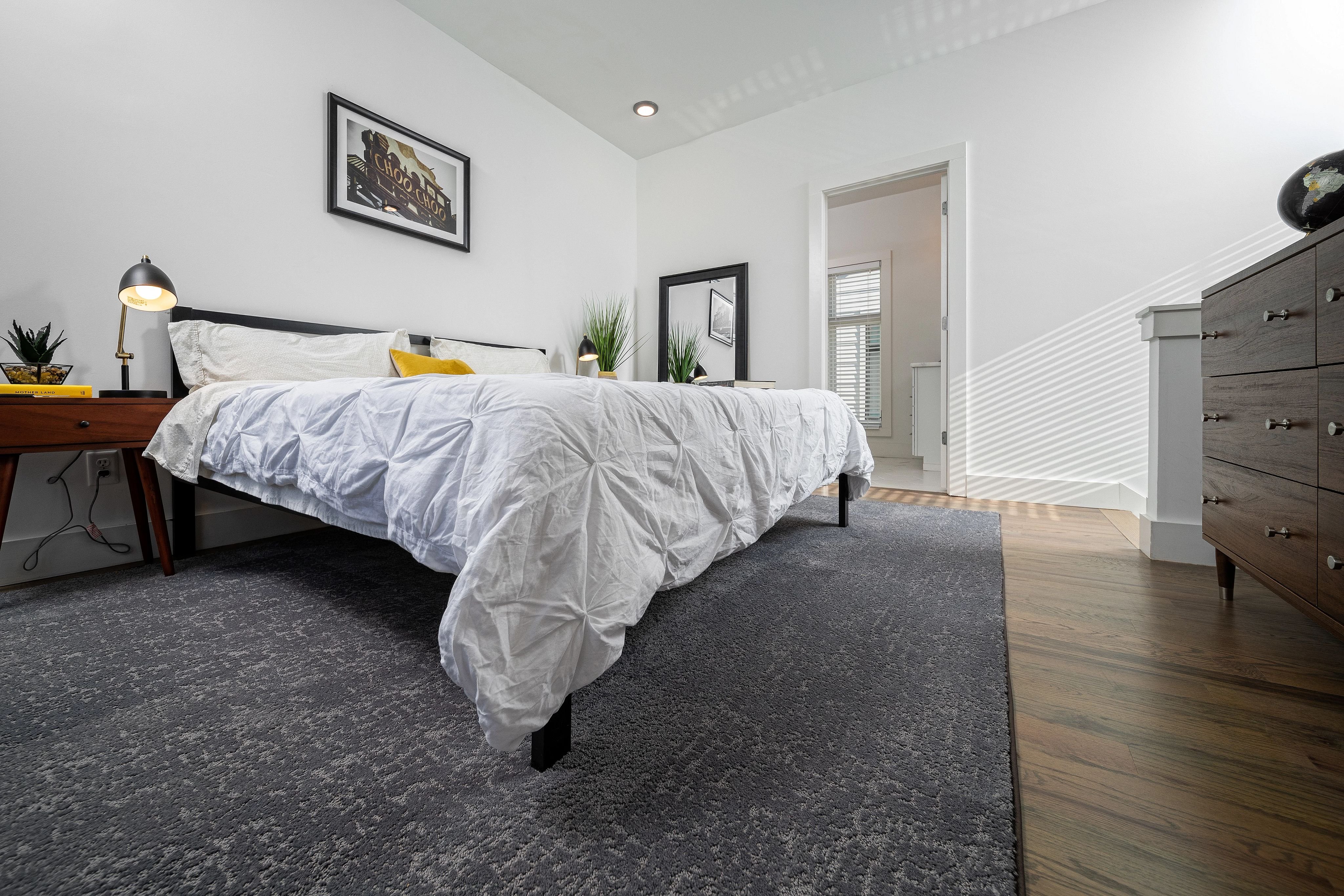 dark grey rug in bedroom