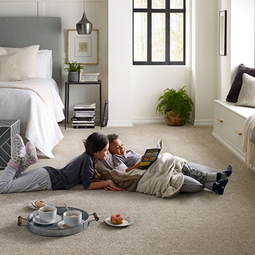 kids reading book on carpet - Kitty Hawk Carpets & Furniture in NC